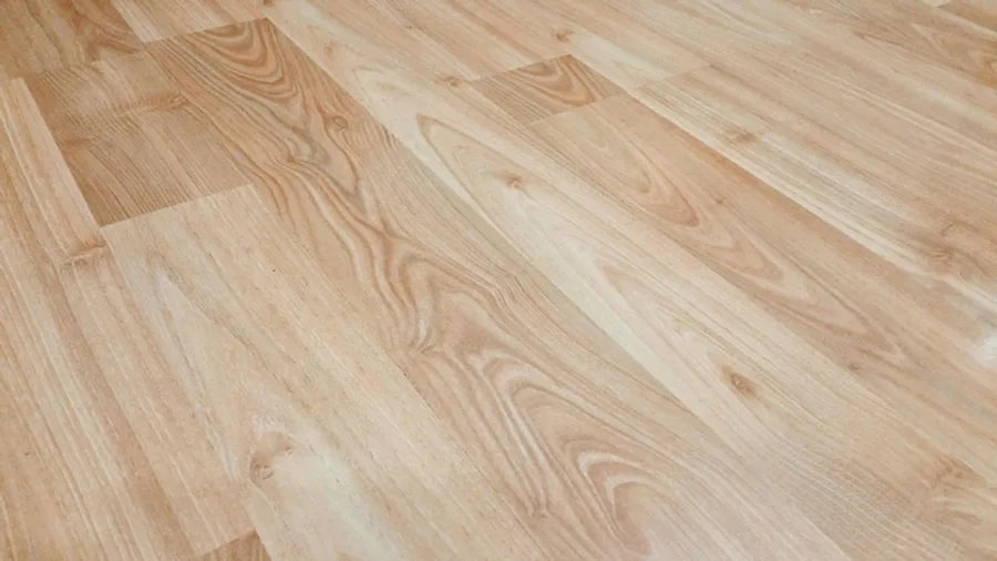Close view of newly laid light oak plank flooring